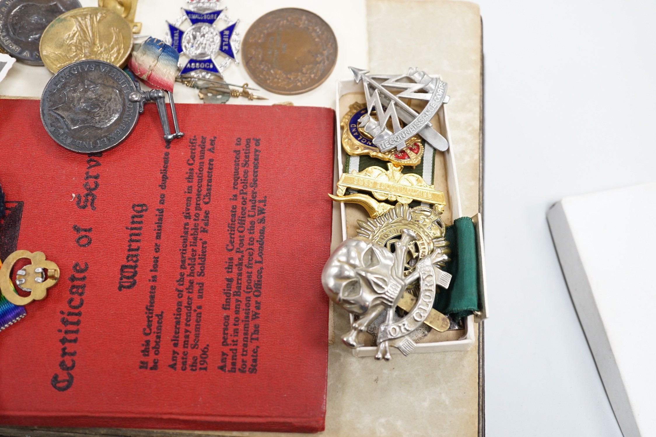 Two pairs of WWI medals awarded to Q.M. & LIEUT. H. BATCHELOR. and 15418 PTE. H. J. BATCHELOR. 19-HRS. together with various military badges, certificates, photographs and paperwork including a regular army certificate o
